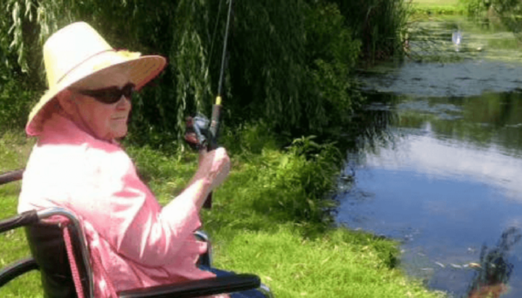 Resident fishing activity in the summer at the Neighbors of Dunn County.