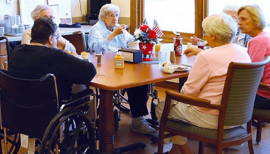 Seniors eating lunch.