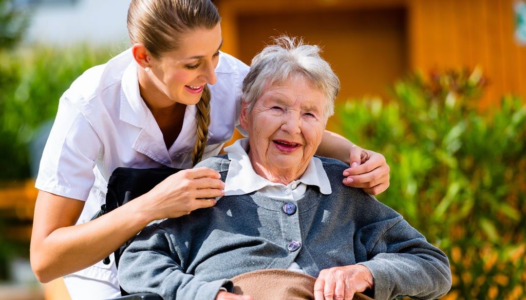 Elderly Woman with Senior Care Worker