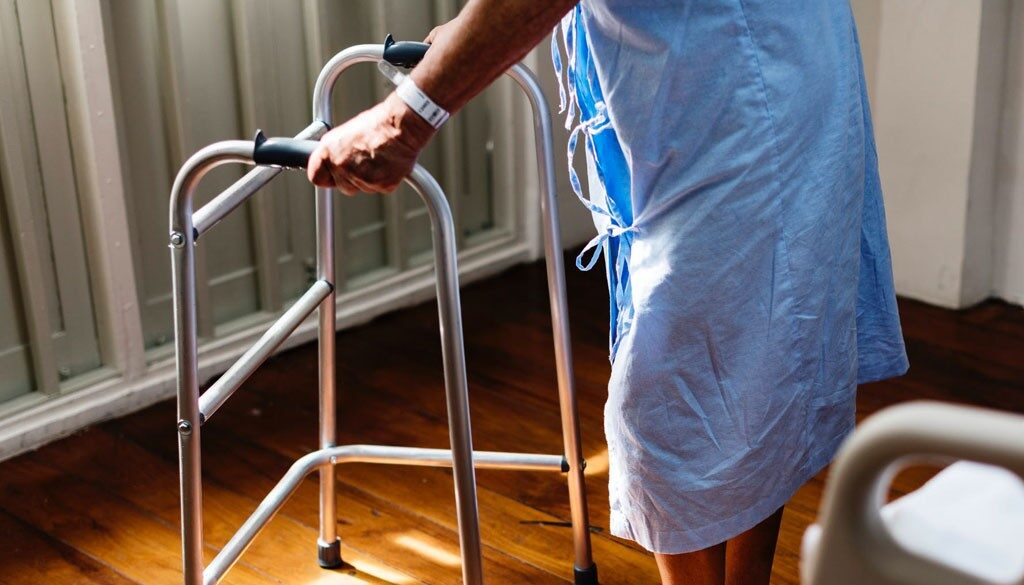 A patient using a walker.