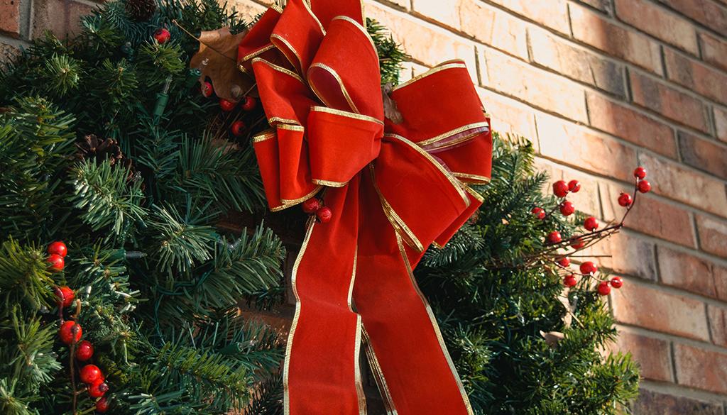 Christmas wreath hanging on a wall.