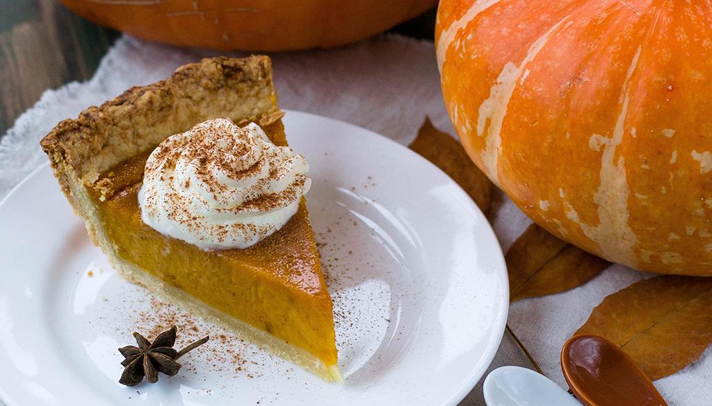 Pumpkin Pie Slice next to a pumpkin.