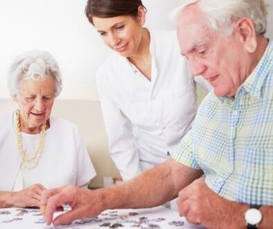 Man and woman doing spring activities with a caregiver.